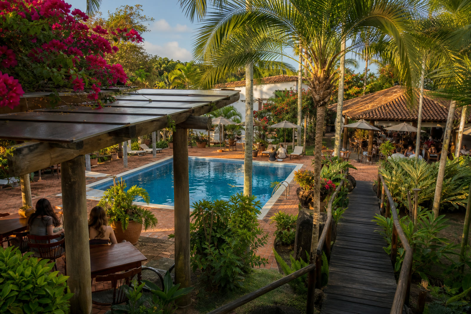 Zona social junto a la piscina